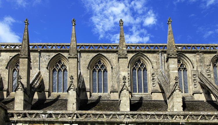 blue skies behind abbey windows