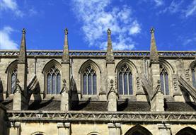 blue skies behind abbey windows