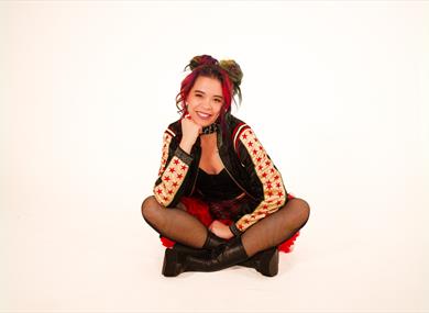 Ria Lina sat cross legged © Rachel Berkowitz