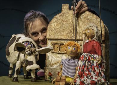 puppet jack at home with cow