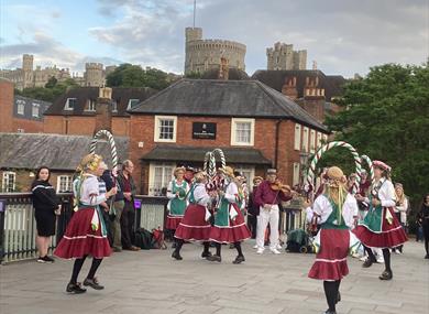 Traditional morris dancing in Windsor on the bridge