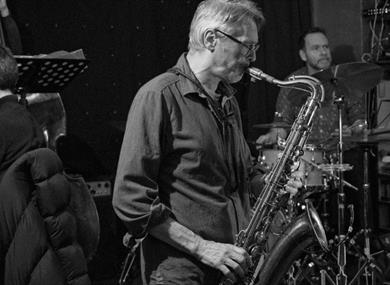 Back and white saxophonist