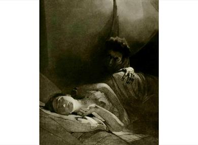 Sketch of a monster leaning over sleeping woman