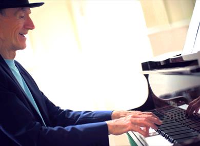 Lawrie Wright Trio - man playing piano