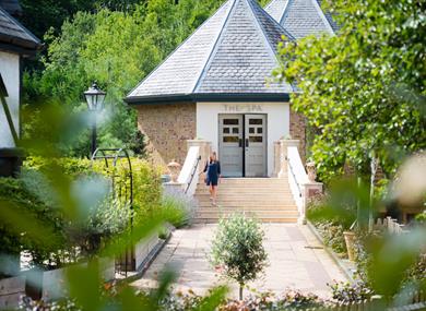 Person walking down the Spa steps at Pennyhill Park, image Amy Murrell