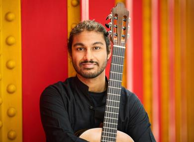Samrat Majumder posed with guitar