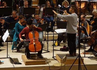 W&MSO - The orchestra rehearsing for a concert at Eton College School Hall.