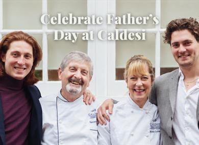 Kate and Giancarlo Caldesi outside the restaurant with their sons