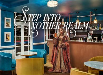 The Royal Adelaide Hotel Bar with person in historic dress holding a pint