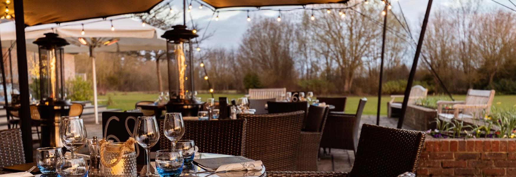 Outdoor dining terrace at Stirrups Hotel