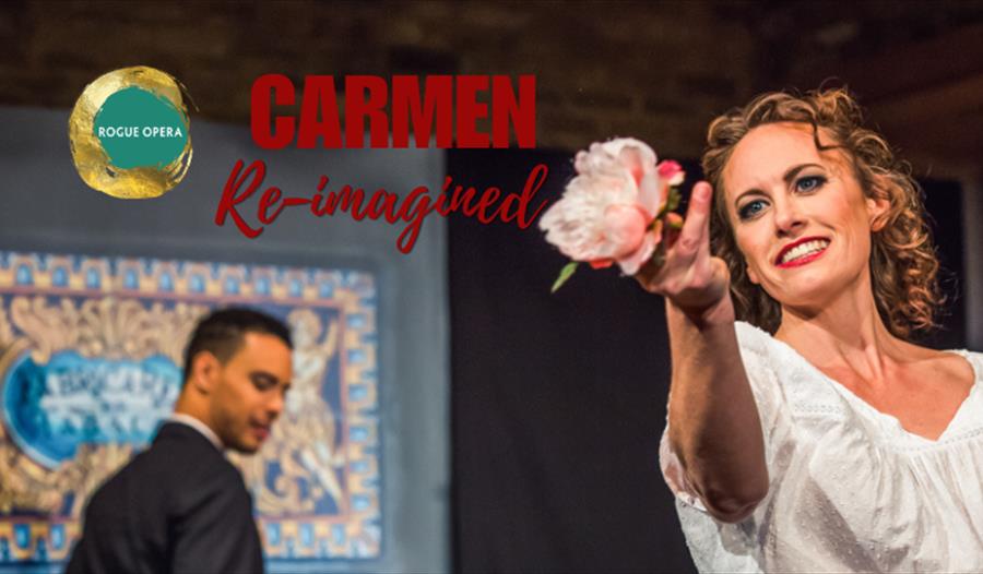 Carmen Re-imagined - Rogue Opera - woman holding flower while man looks on