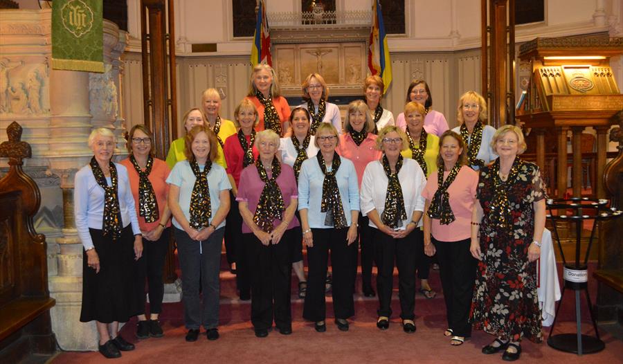 Claremont Singers - group photo in a church