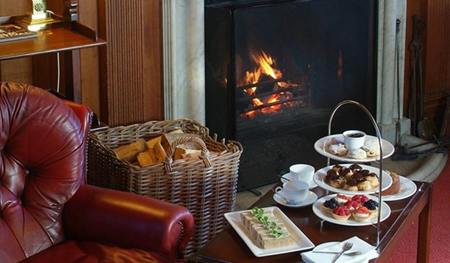 Festive Afternoon Tea in front of fire at Cumberland Lodge