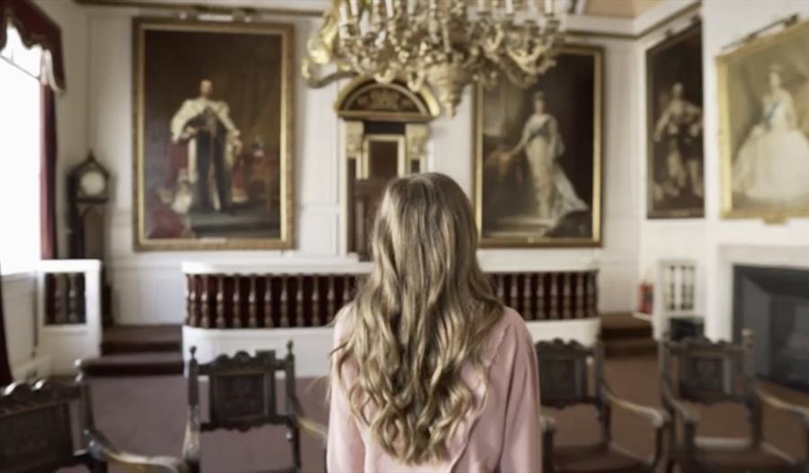 Girl touring Windsor Guildhall's Chamber