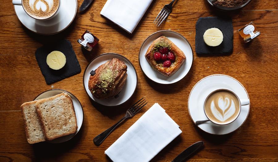 pastries, toast, butter, jam and coffee as part of Hinds Head coffee morning