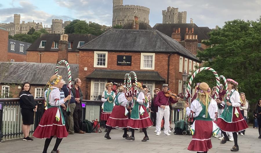 Traditional morris dancing in Windsor on the bridge
