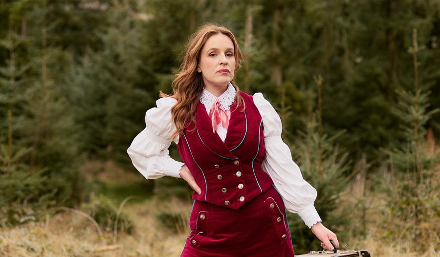 Katie Norris  - dressed in an old west outfit