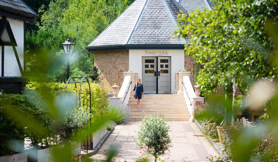 Person walking down the Spa steps at Pennyhill Park, image Amy Murrell