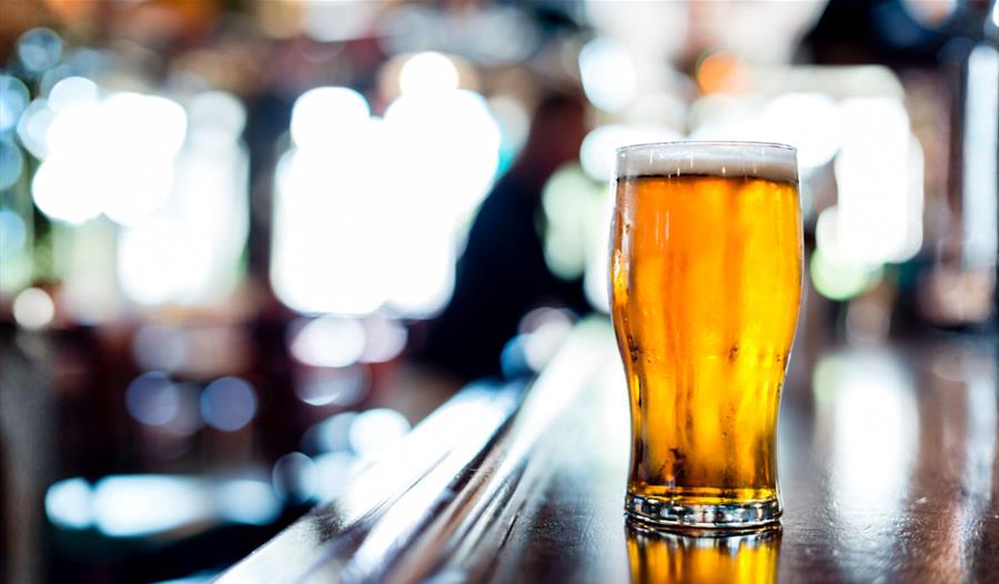 Pint of beer on a bar