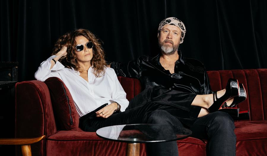 The Grahams sat in a club booth