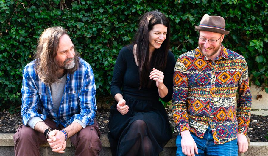 The Lost Trades - group sat on a garden wall