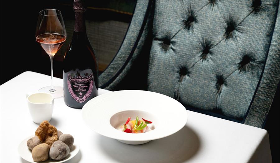 Food and drink on table in the Tudor Pass