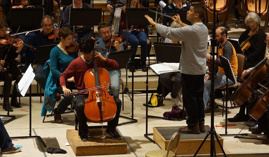W&MSO - The orchestra rehearsing for a concert at Eton College School Hall.