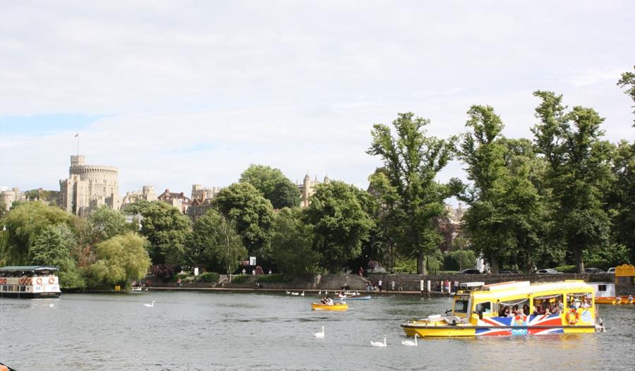 Windsor Duck Tours on River Thames with Windsor Castle in distance