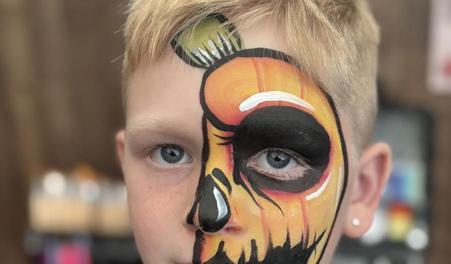 Young person with Halloween makeup
