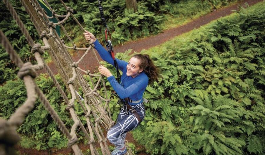 Go Ape Bracknell | person climbing ropes in the trees