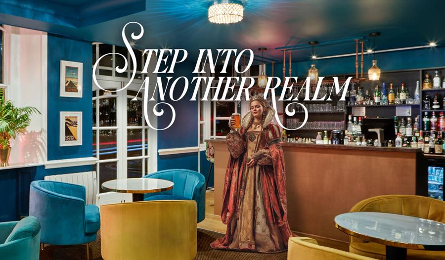 The Royal Adelaide Hotel Bar with person in historic dress holding a pint