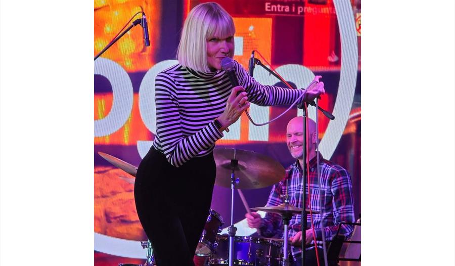 Sarah Jane Eveleigh - singing on stage