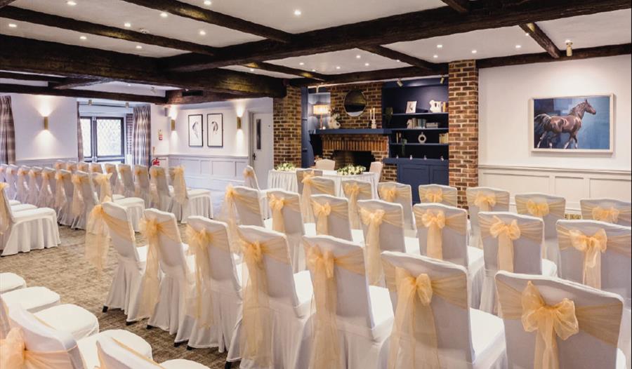 Stirrups Hotel - room decorated for wedding ceremony