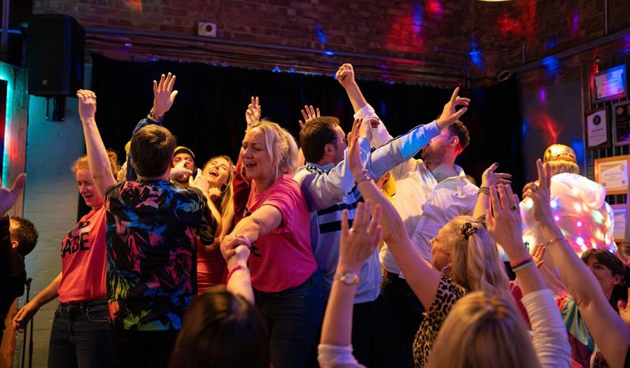 People dancing at Wildcat Willie's Music Bingo
