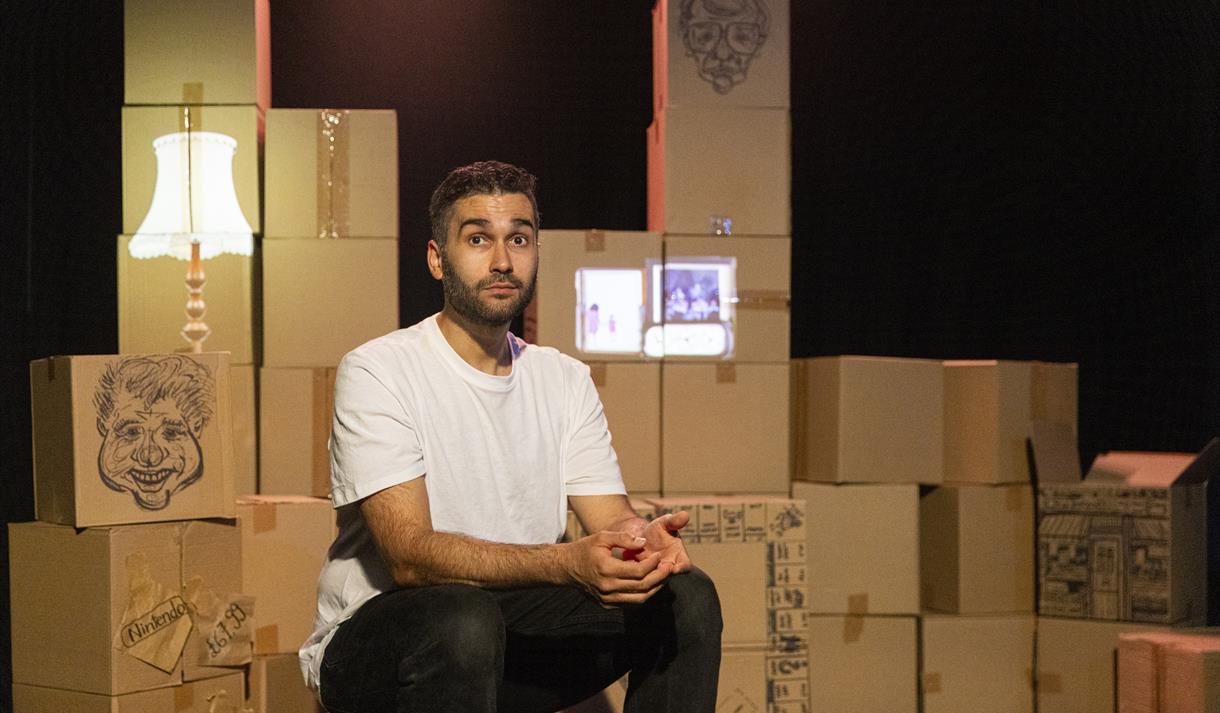 It’s the Economy, Stupid! - Man sat in front of cardboard boxes