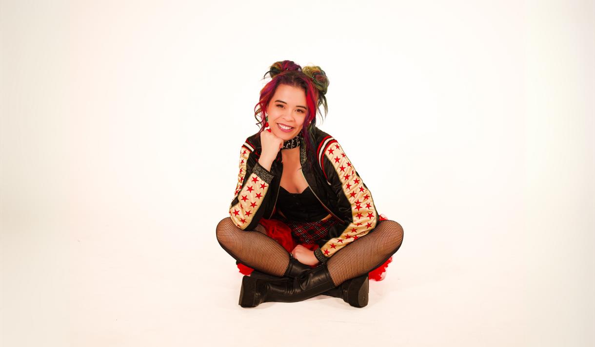 Ria Lina sat cross legged © Rachel Berkowitz