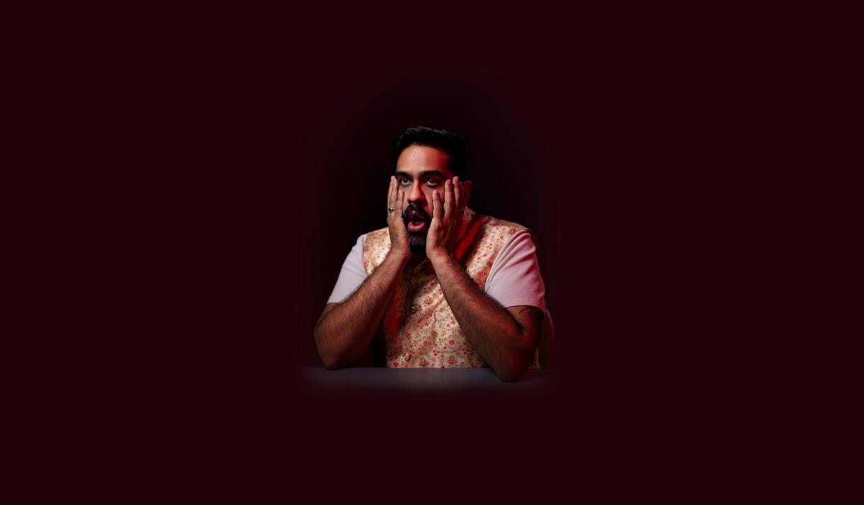 Man holding his face - Eshaan Akbar: Can’t Get No Satisfakshaan