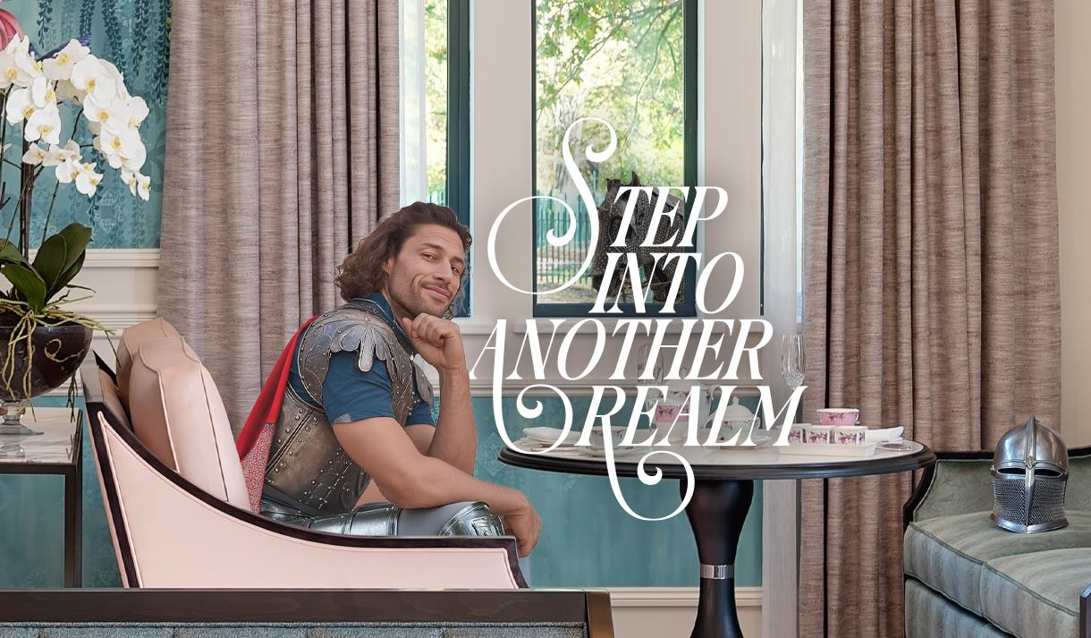 Step into another realm | person in battle dress sitting in Fairmont Windsor Park lounge, helmet on chair and horse visible through the window