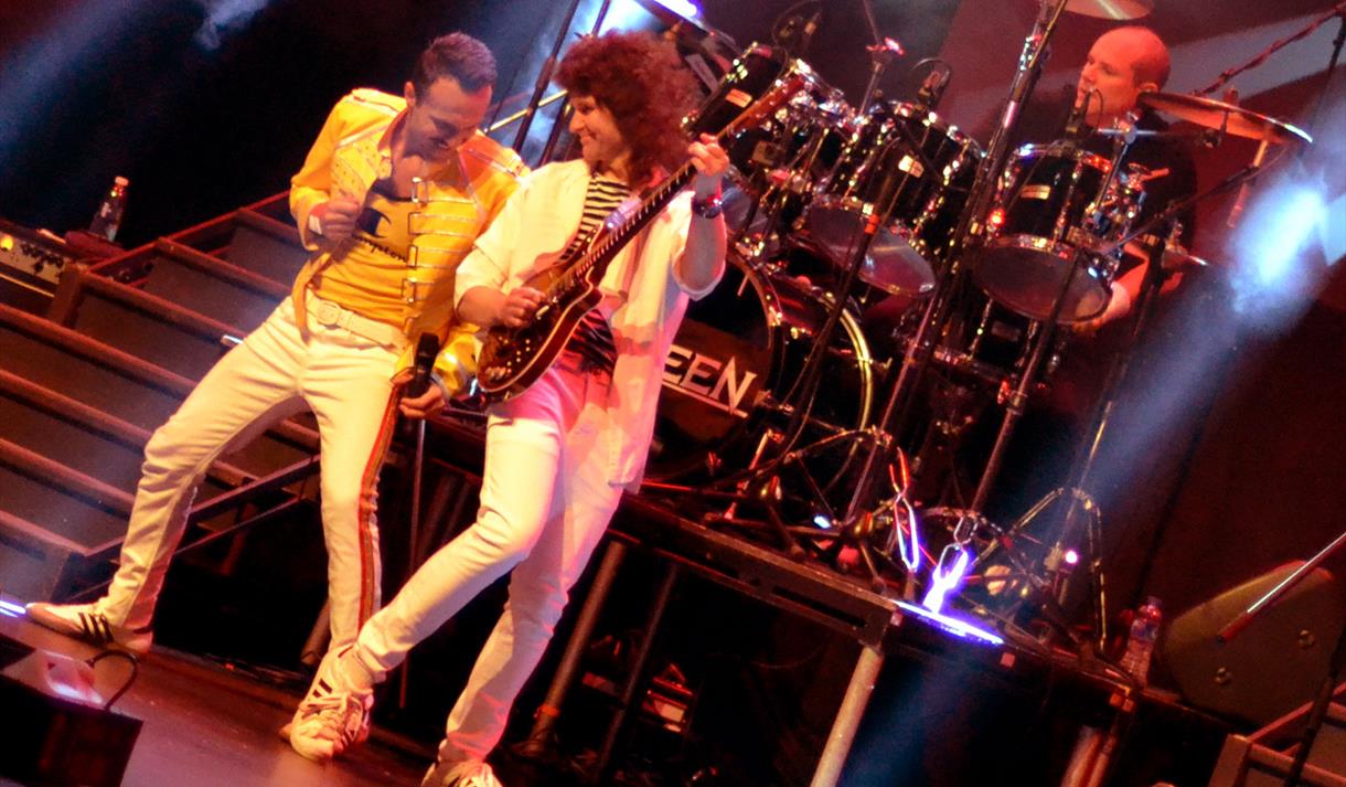 Flash performing on stage