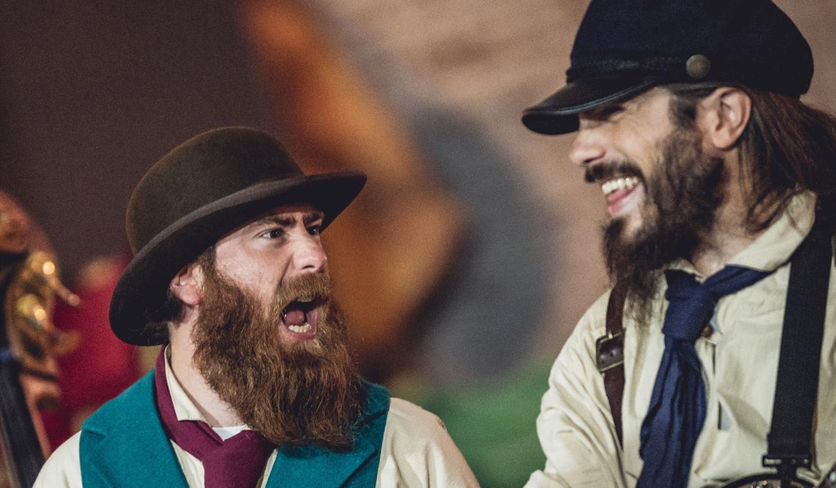 Old Time Sailors - two bearded men in traditional clothing singing