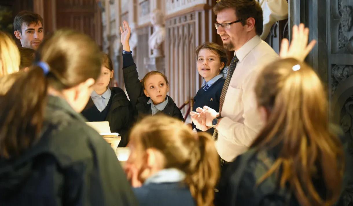 Children and adults at World Book Day display © Royal Collection Enterprises Limited 2026 | Royal Collection Trust