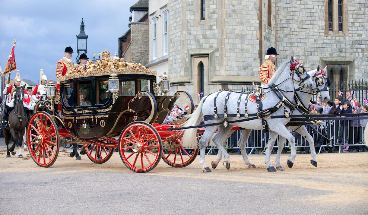 French State Visit to Windsor 2008, image Doug Harding.  Queen Elizabeth II and President Sarkozy ride in a horse-drawn carriage on the Long Walk
