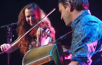 Walther & Cutting performing on stage