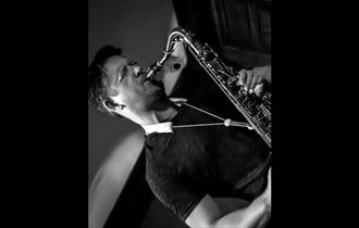 Paul Booth playing Sax