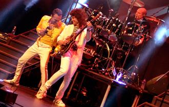 Flash performing on stage