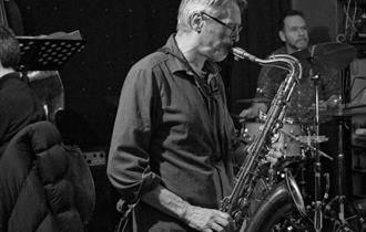 Back and white saxophonist