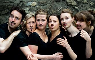 Impromptu Shakespeare - cast with Shakespearian facial hair drawn on
