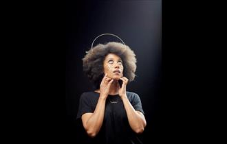 Kate Cheka ©bennyjjohnson - lady looking up all in black with a halo