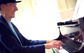 Lawrie Wright Trio - man playing piano