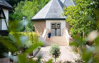 Person walking down the Spa steps at Pennyhill Park, image Amy Murrell